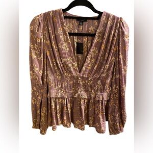 Anthropology~Current Air
Floral V-Neck Blouse in Purple/Yellow
Size Small
New